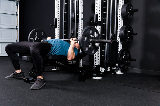 Athlete does a bench press.