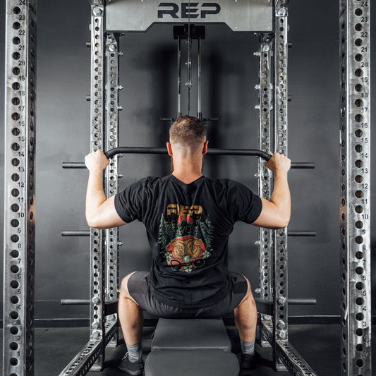 Man doing lat pulldowns