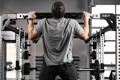Athlete doing pull-ups on the Crossmember Multi-Grip Pull-Up Bar