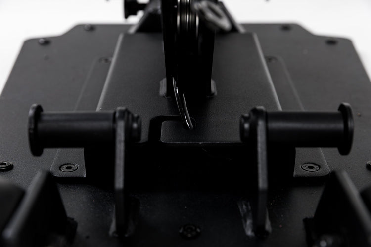 Close-up shot of the band pegs and cable housing on the Leg Extension & Leg Curl Bench Attachment