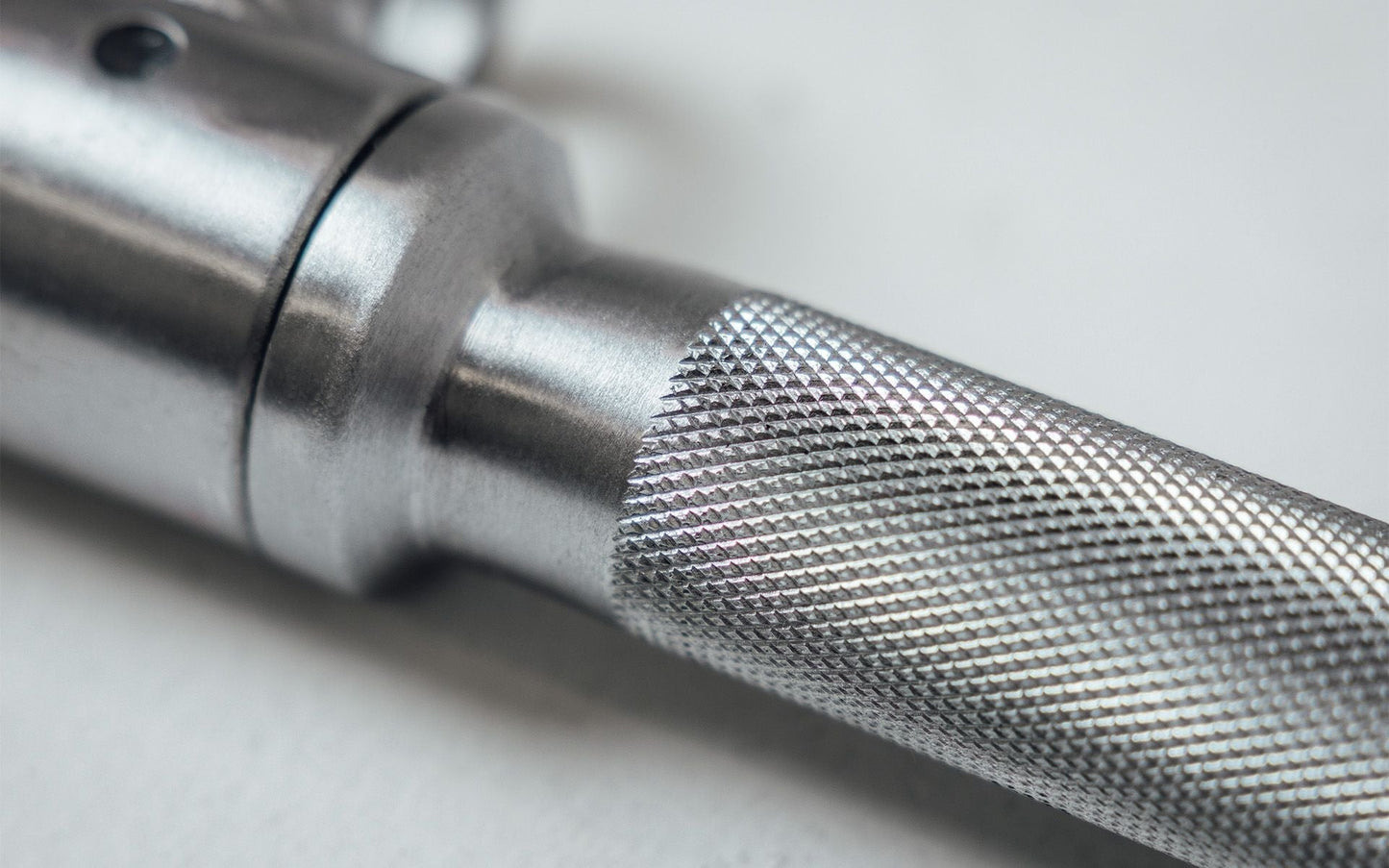 Close Up of Solid Lat Bar Knurling Texture from Rep Fitness UK | Shop Best Premium Gym Equipment for Home & Commercial Use Online